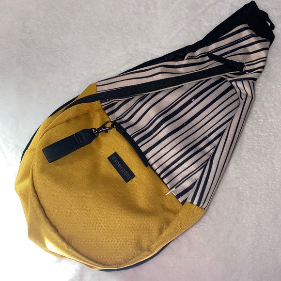 Sherpani Espirit Sling backpack in the color yellow black white - Picture 5 of 11